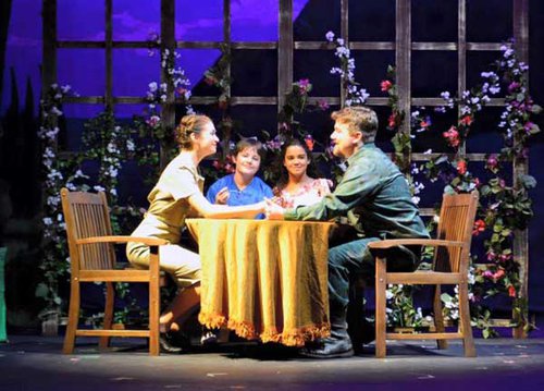 Nathan Short plays Emile de Becque, right, during a scene from South Pacific. 