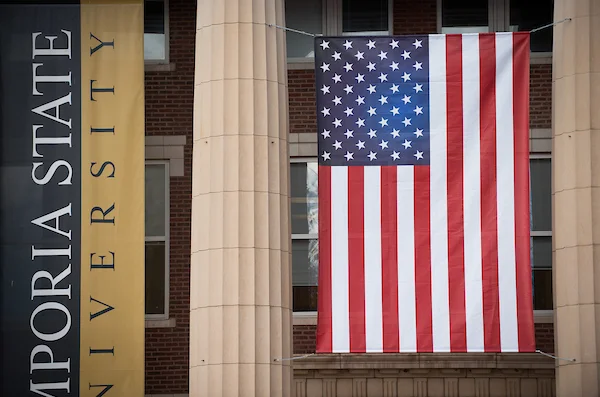 Flag hanging from Emporia State's Plumb Hall