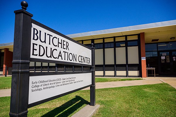 one story building with sign in front